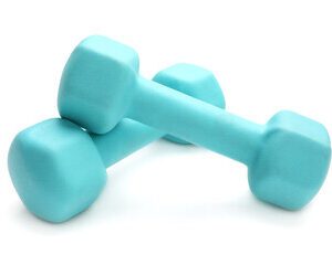 Two blue dumbbells are sitting on top of a white surface.